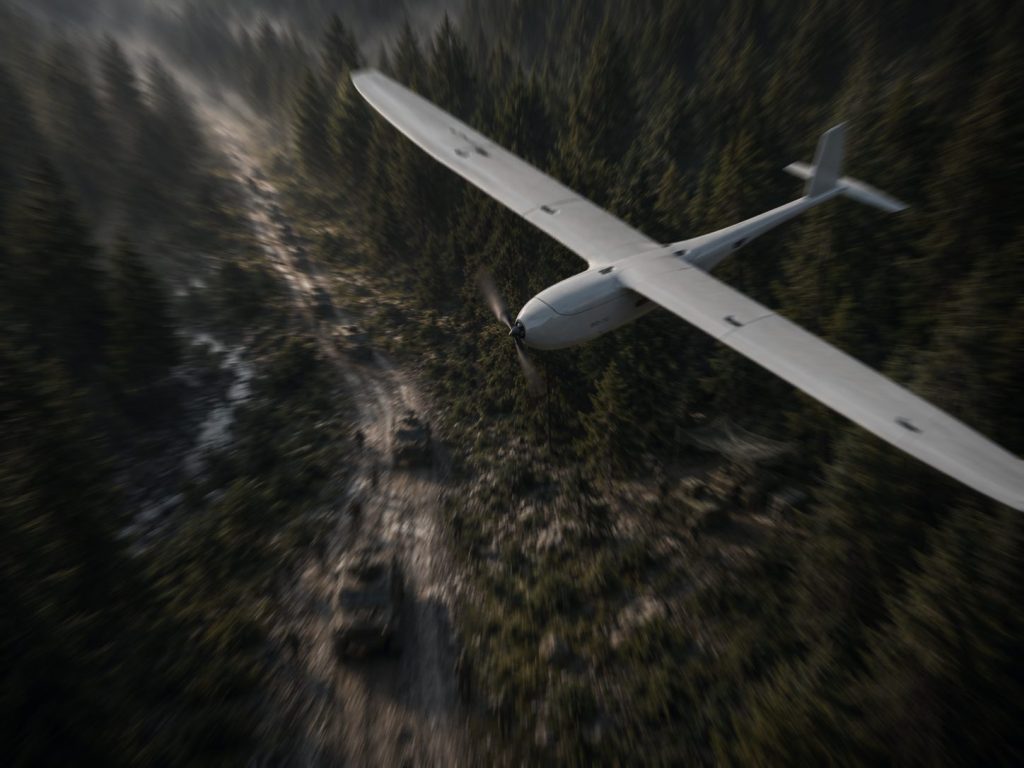 RQ-70 Dainn in flight over forest