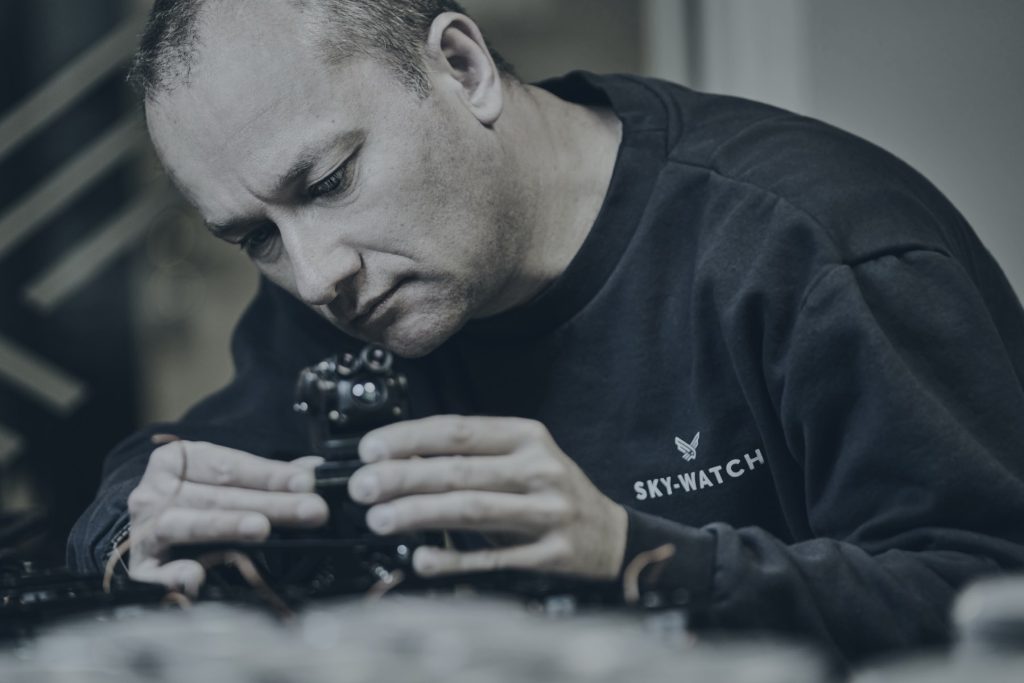 Sky-Watch technician servicing a sensor payload